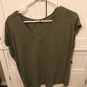 Jessica Simpson green shirt